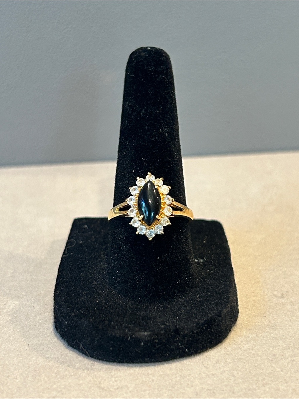 Gold Ring with Black Marquise Stone and Clear Halo